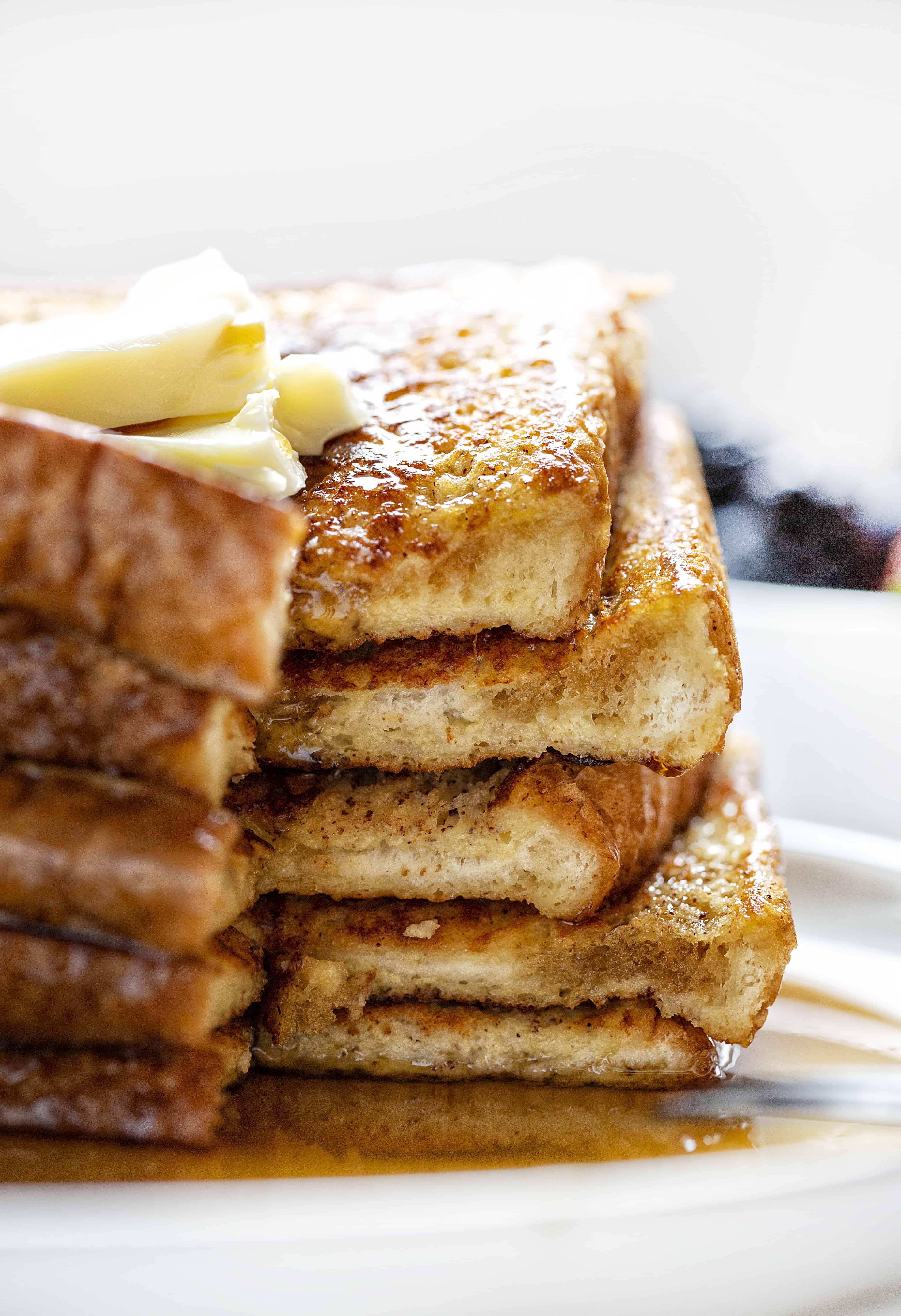 This is the recipe that won't fail you! Perfect flavor and consistency, every time! french toast, easy french toast, how to make french toast, french toast recipe, iambaker Stacked French Toast Cut Into Showing Inside.