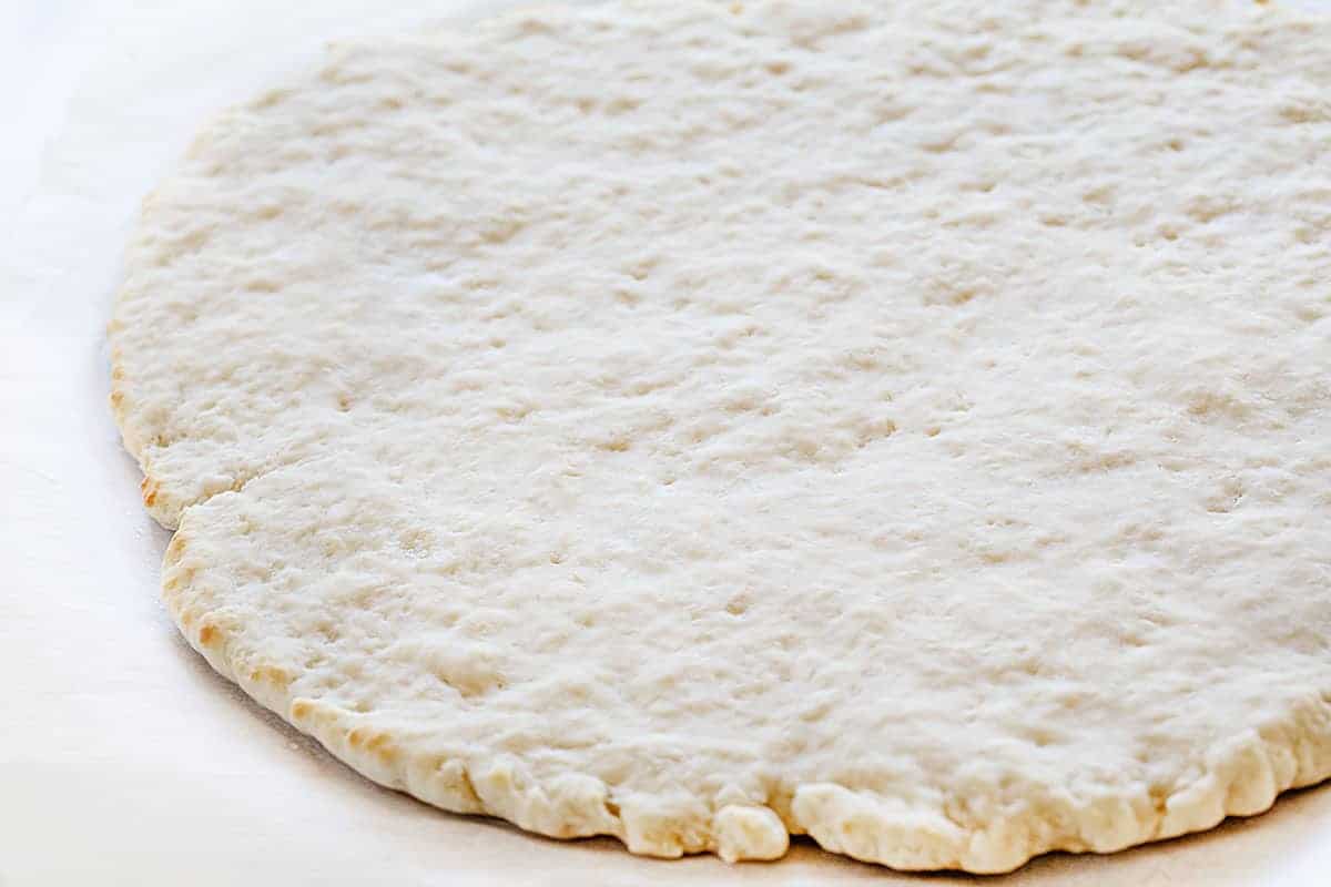 This recipe has been TESTED and PERFECTED! A glorious cinnamon-sugar dessert pizza covered in the best sweet glaze. A fan favorite! cactus bread, copycat cactus bread, dessert pizza, crispy cinnamon dessert, dessert, baking, recipes, iambaker Pizza Dough for Cactus Bread Dessert Pizza