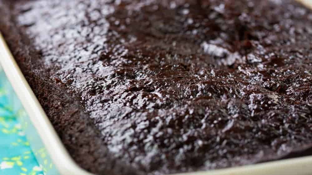 This cake is SO rich and decadent you will never know there is zucchini in it! #zucchini #zucchinicake #chocolatecake #chocolate #baking #iambaker Easy Chocolate Zucchini Cake