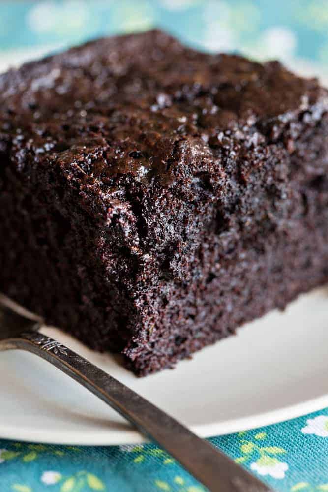 This cake is SO rich and decadent you will never know there is zucchini in it! #zucchini #zucchinicake #chocolatecake #chocolate #baking #iambaker Chocolate Zucchini Cake Recipe