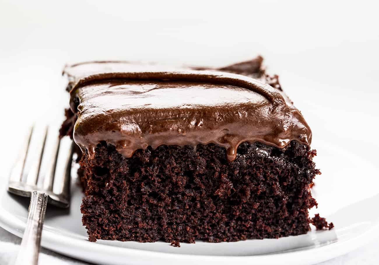 These tried and true top ten recipes from January 2021 have you covered from main dishes, to sweet treats, to desserts! i am baker, iambaker, depression cake, wacky cake, chocolate cake, chocolate frosting, dessert, baking Depression Cake Slice