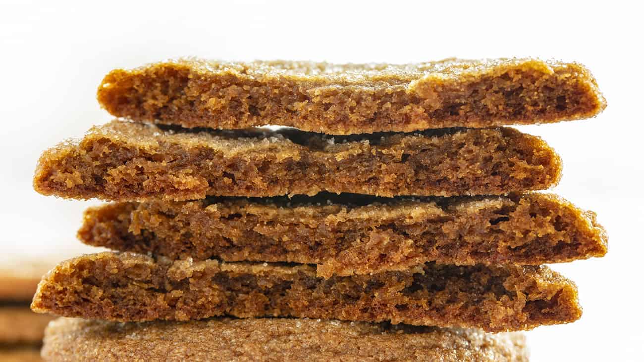 With all the flavors of a ginger snap, but without the crisp bite, this Ginger Cookie is a soft and chewy sweet treat! ginger cookie, soft ginger cookie, cookie recipes, holiday treats, iambaker, baking, easy cookie recipes Soft Ginger Cookies Stacked and Broken