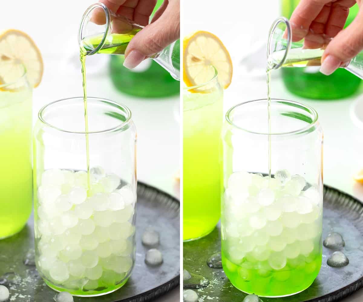 Hulk Smash is an alcoholic beverage made with Midori, sour apple liqueur, and lemonade, all poured over lemonade ice cubes. Both the name and the green color of the drink will remind you of the fictional character 'The Hulk' from Marvel Comics! But don't worry, you won't turn into the Hulk after drinking one, but the sweet drink does pack a punch (pun intended)! Adding Midori and Sour Apple Liqueur to a Glass with Lemonade Ice Cubes to Make Hulk Smash Cocktail.