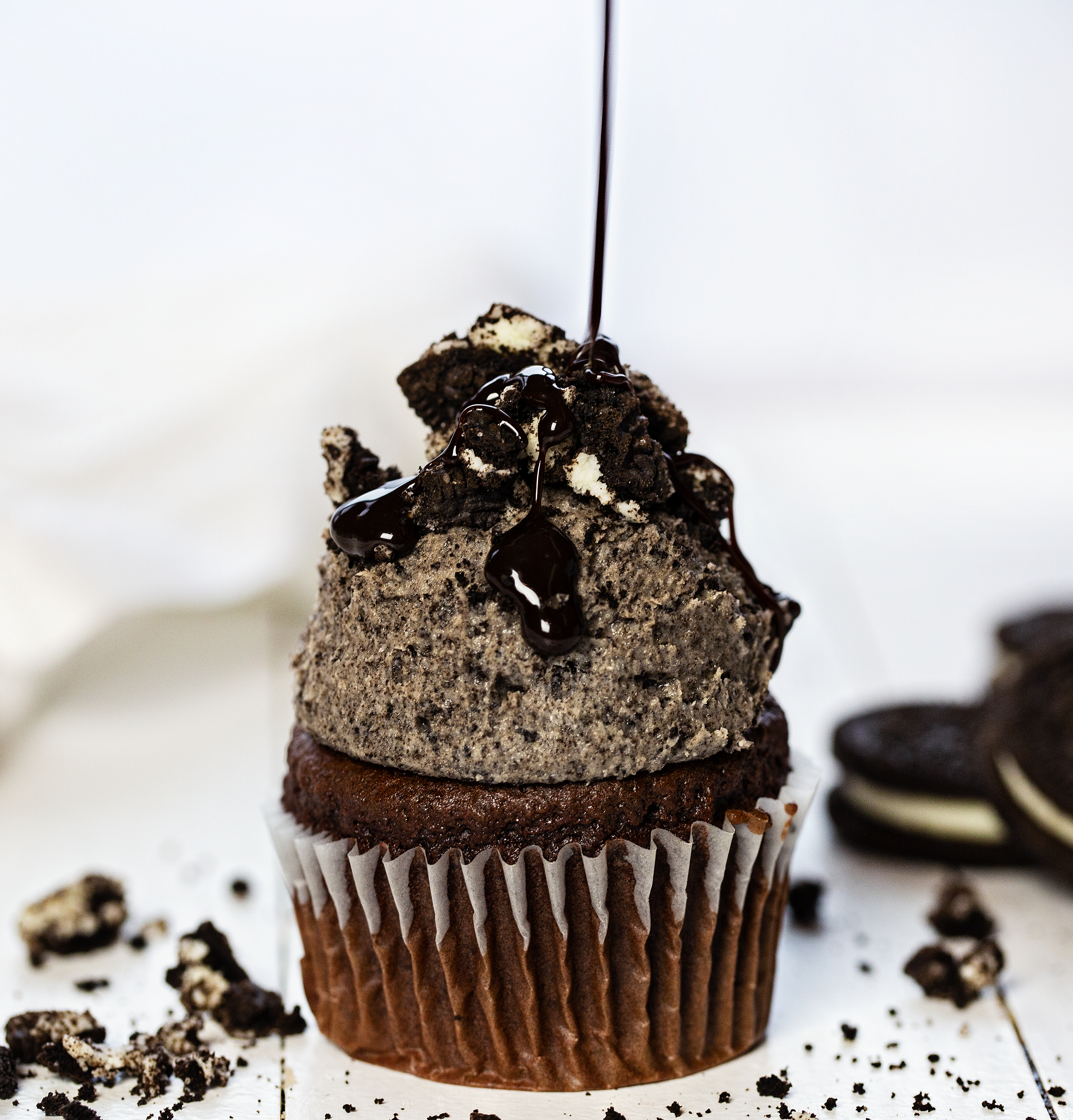 This Chocolate Cupcake with Oreo Buttercream is a cookie and cupcake lovers dream! oreo, buttercream, oreo buttercream, chocolate cupcake, oreo cupcake, dessert recipes, dessert, oreo recipes, cupcake recipes, iambaker Chocolate Cupcake with Oreo Buttercream Recipe