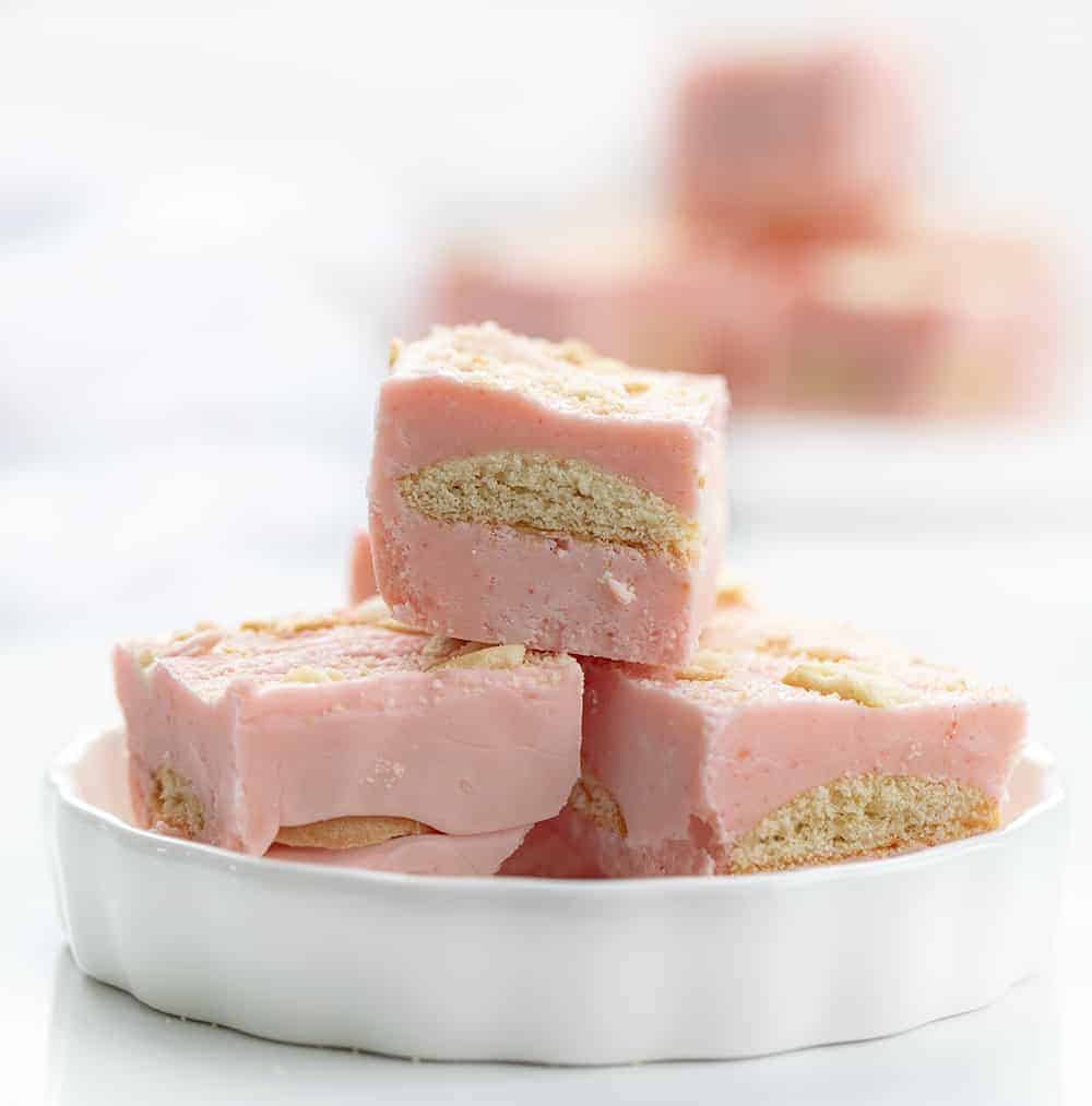 These tried and true top ten recipes from January 2021 have you covered from main dishes, to sweet treats, to desserts! i am baker, iambaker, strawberry shortcake fudge, fudge recipes, strawberry fudge, vanilla wafers, wafers, dessert, strawberry treats Strawberry Shortcake Fudge Stacked on Plate