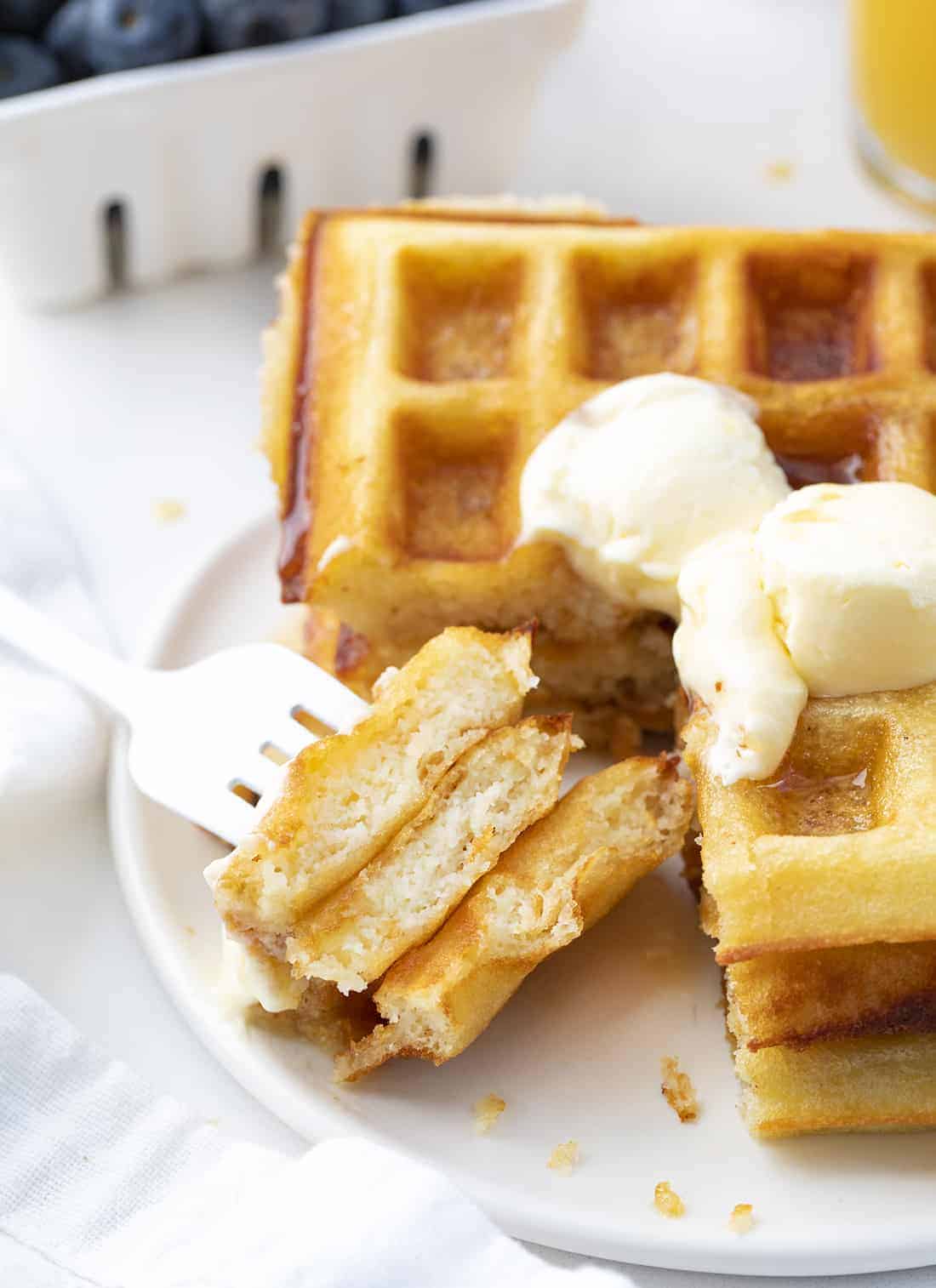 Waffles of Insane Greatness are waffles that are made from a copycat of Aretha Frankenstein's popular waffle mix. Waffles, Waffle REcipes, Breakfast, Breakfast Recipes, How to Make Waffles, The Best Waffles, i am baker, iambaker, recipes Fork with Waffles of Insane Greatness on it